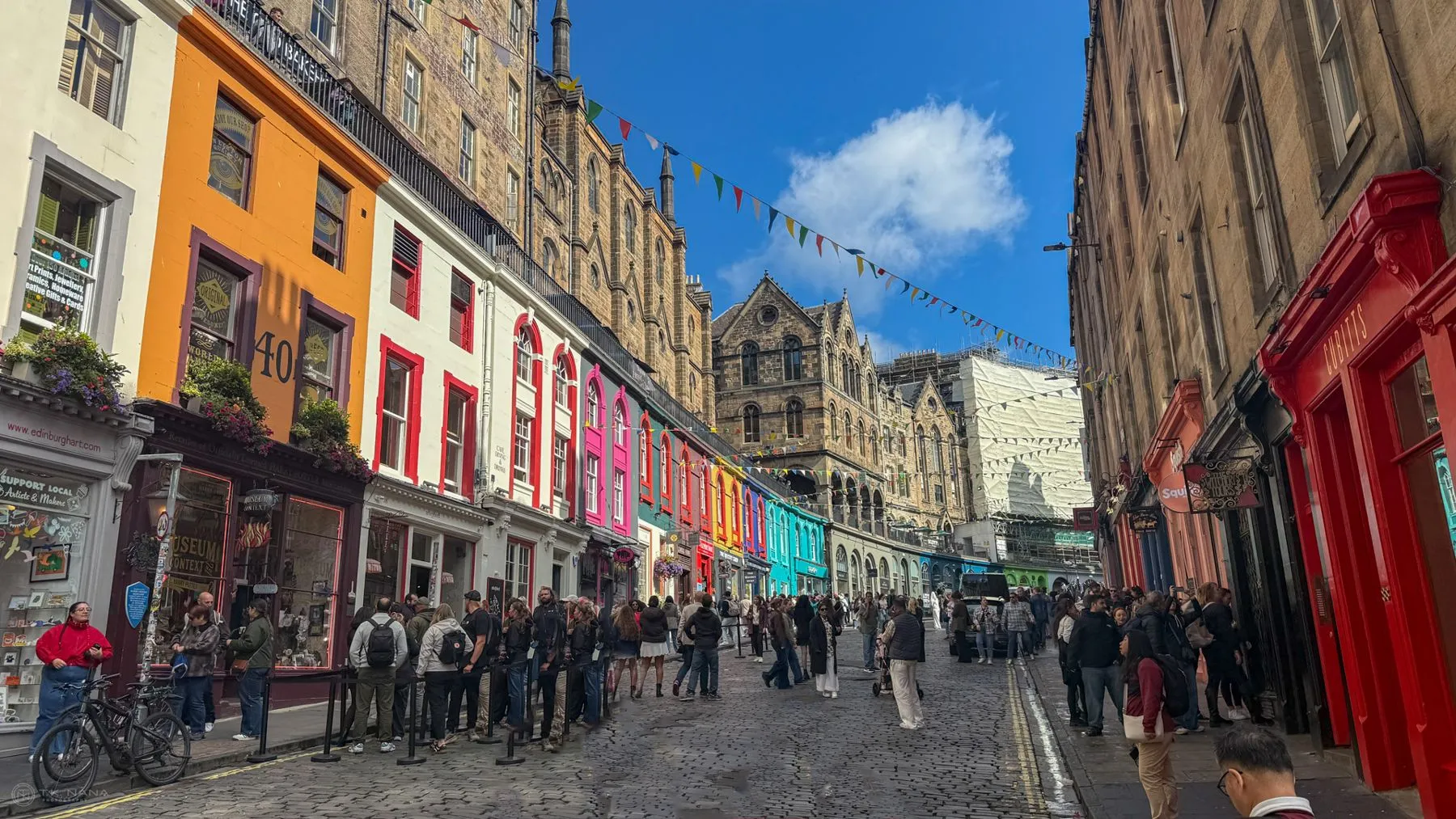 The brightly painted shopfronts of Victoria Street, Edinburgh